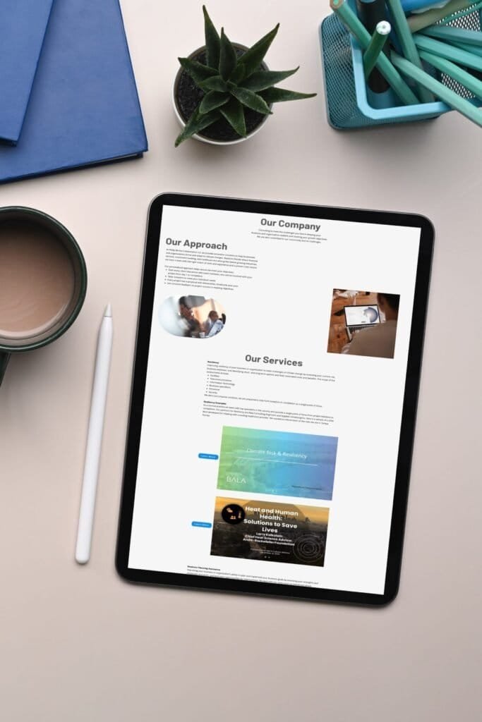 iPad displaying Phil Michele Consulting homepage, styled on a modern desk with stylus, coffee, and books.